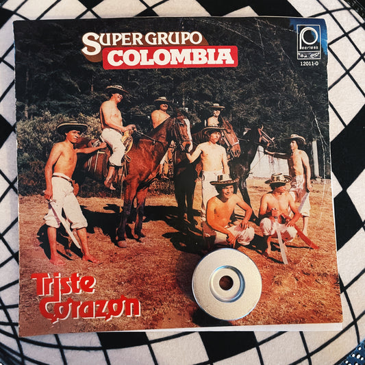 7¨| Super Grupo Colombia ‎– Triste Corazon