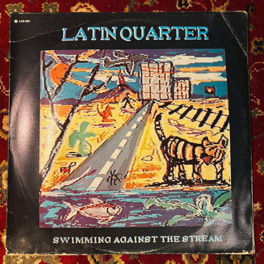 Latin Quarter – Swimming Against The Stream