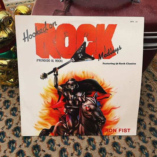 Iron Fist ‎– Hooked On Rock