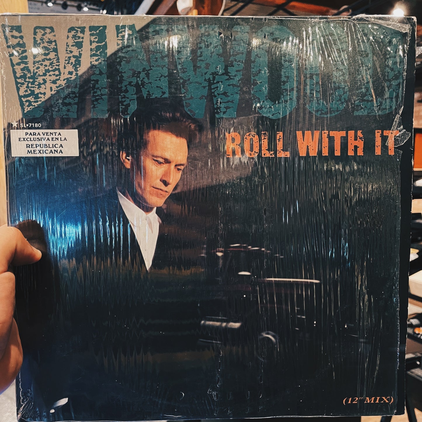 Steve Winwood ‎– Roll With It