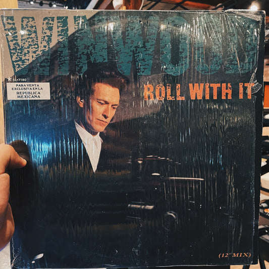 Steve Winwood ‎– Roll With It