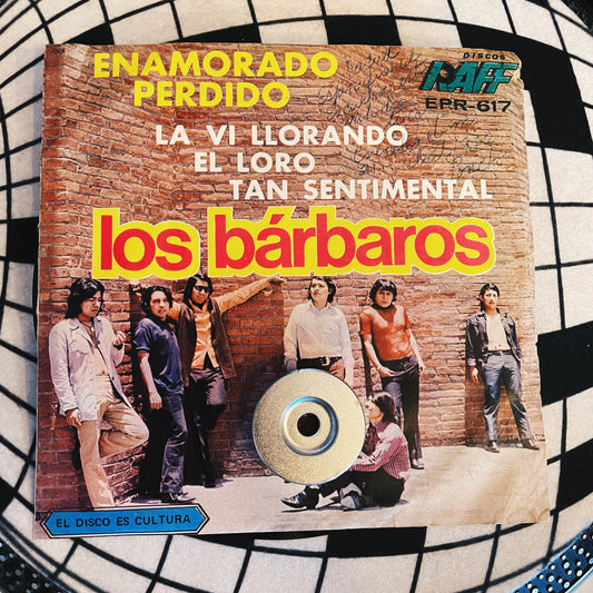 7¨| Los Barbaros – Enamorado Perdido / El Loro