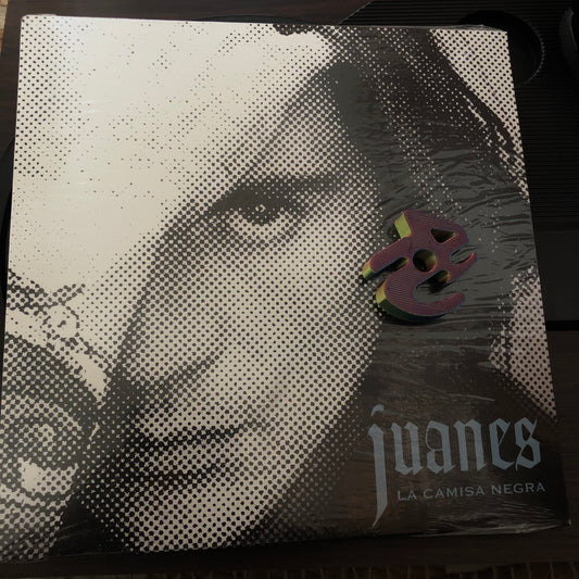 7¨| Juanes ‎– La Camisa Negra